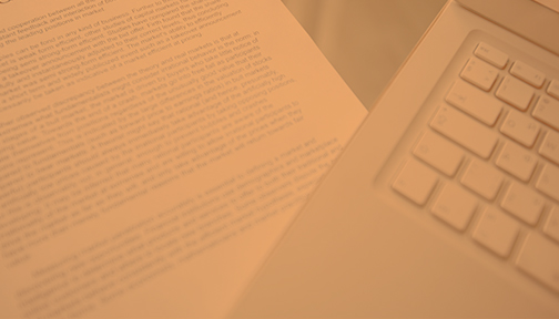 Document under a laptop
